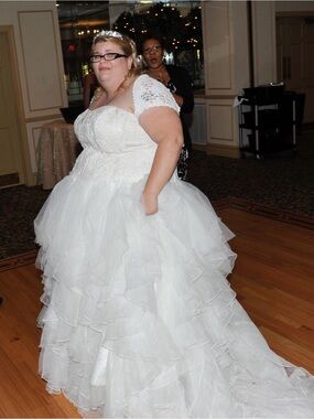 White Ruffled Lace Bridal Ballgown. Shrug Not Included.